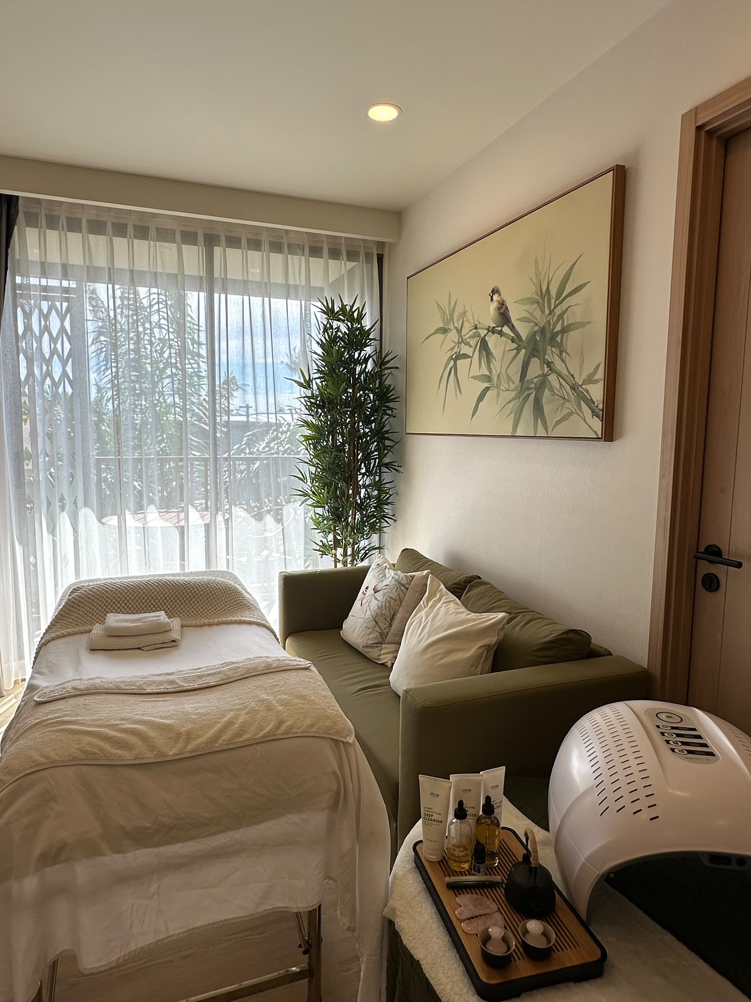 A calm in-home facial massage setup in Phuket